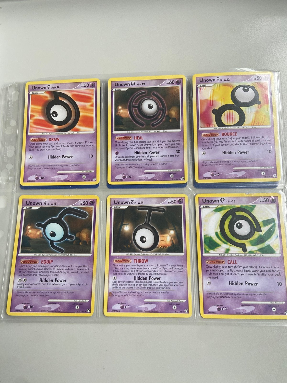 Unown collectie (2007,2008) pokemon, Ophalen of Verzenden, Zo goed als nieuw, Meerdere kaarten, Foil