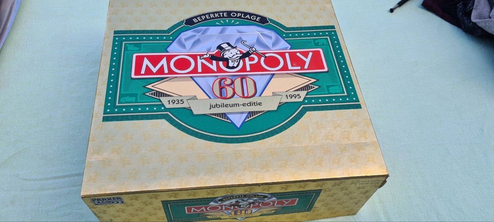 monopoly 60 jaar editie nooit mee gespeeld, Ophalen of Verzenden, Zo goed als nieuw