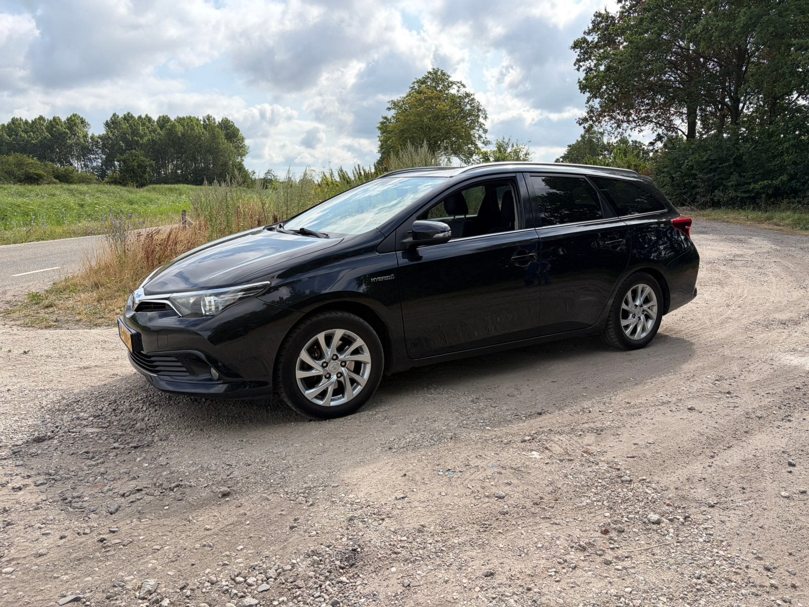 Toyota Auris 1.8 Hybrid Touring Sports CVT 2016 Zwart, Euro 5, 28 km/l, Zwart, Zwart