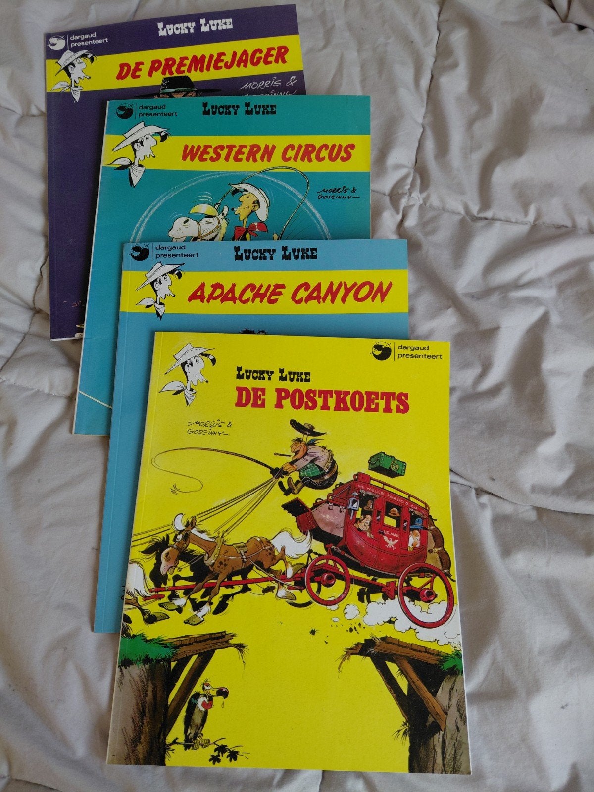 Lucky Luke stripboeken - 4 delen, Meerdere stripboeken, Ophalen of Verzenden, Gelezen, Morris & Goscinny