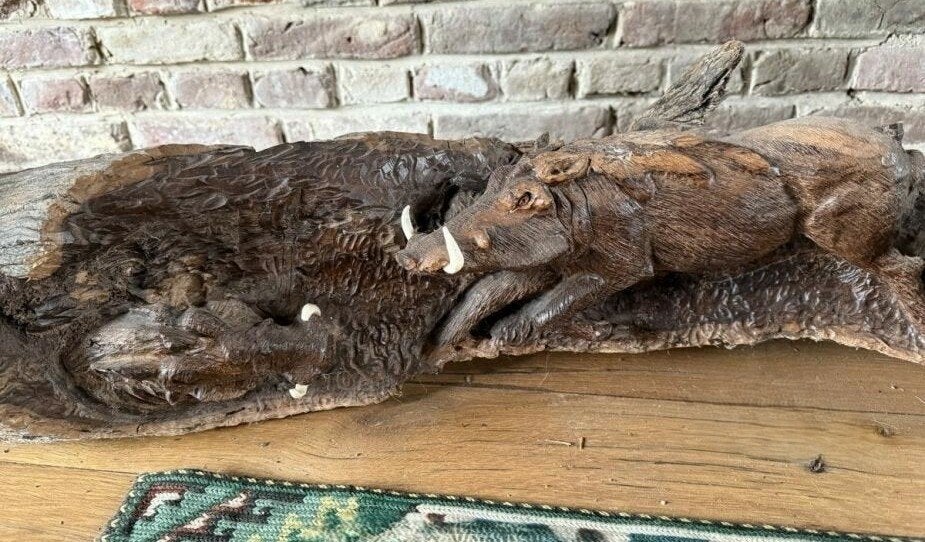 Houten wandsculptuur met everzijnen in reliëf, Ophalen