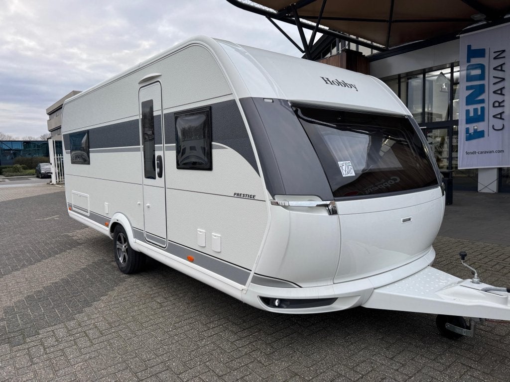 Hobby Prestige 560 FC 2026 MEGA KORTING € 3200,-!!!, Caravans en Kamperen, Standaardzit, Bedrijf, Schokbreker, 5 tot 6 meter