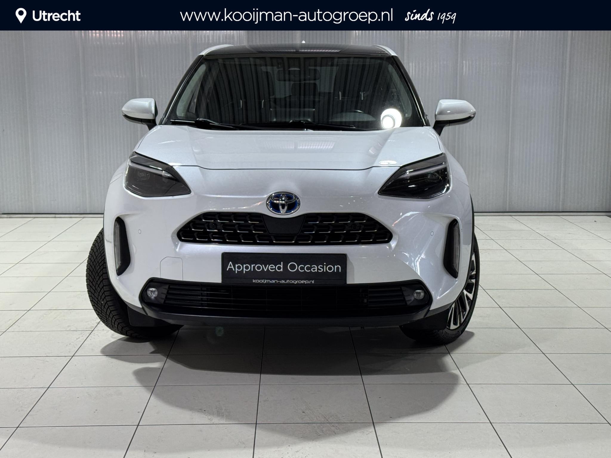 Toyota Yaris Cross 1.5 Hybrid Executive Panoramadak, Stoelve, Gebruikt, Wit, 1490 cc, Bedrijf
