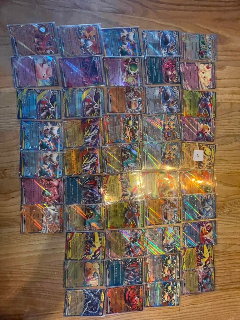 50 japanse ex pokemon kaarten, Ophalen of Verzenden, Zo goed als nieuw, Meerdere plaatjes
