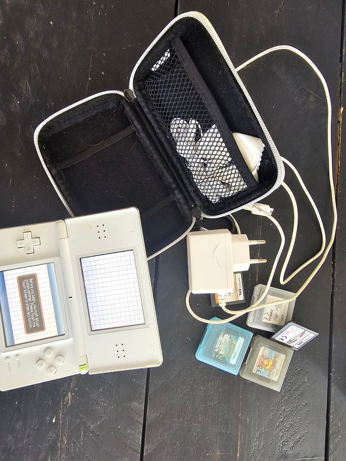 Nintendo DS Lite Wit met 5 games en accessoires, Met games, Gebruikt, Wit, Ophalen of Verzenden