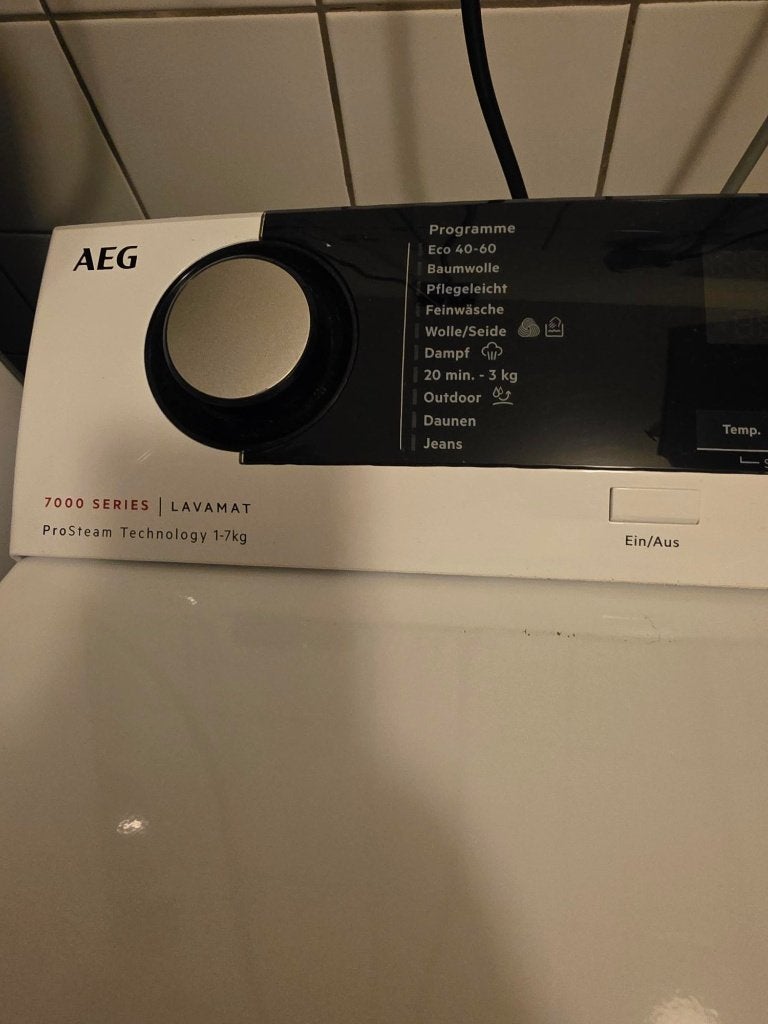 AEG. Wasmachine Bovenlader 7 kg – Stoomfunctie, Ophalen, Bovenlader, Zo goed als nieuw, 85 tot 90 cm