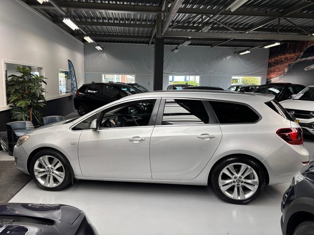 Opel Astra Sports Tourer 1.4 Turbo Sport / Navi / Airco, Auto's, Opel, Voorwielaandrijving, Euro 5, Stof, Gebruikt