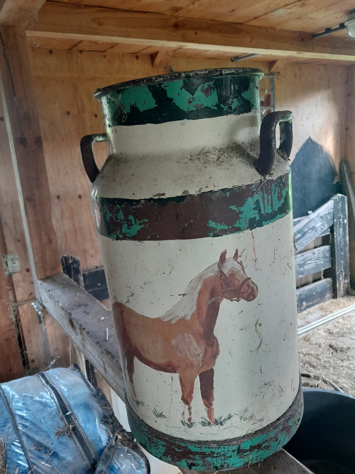aluminium melkbus met paardenschildering, Ophalen