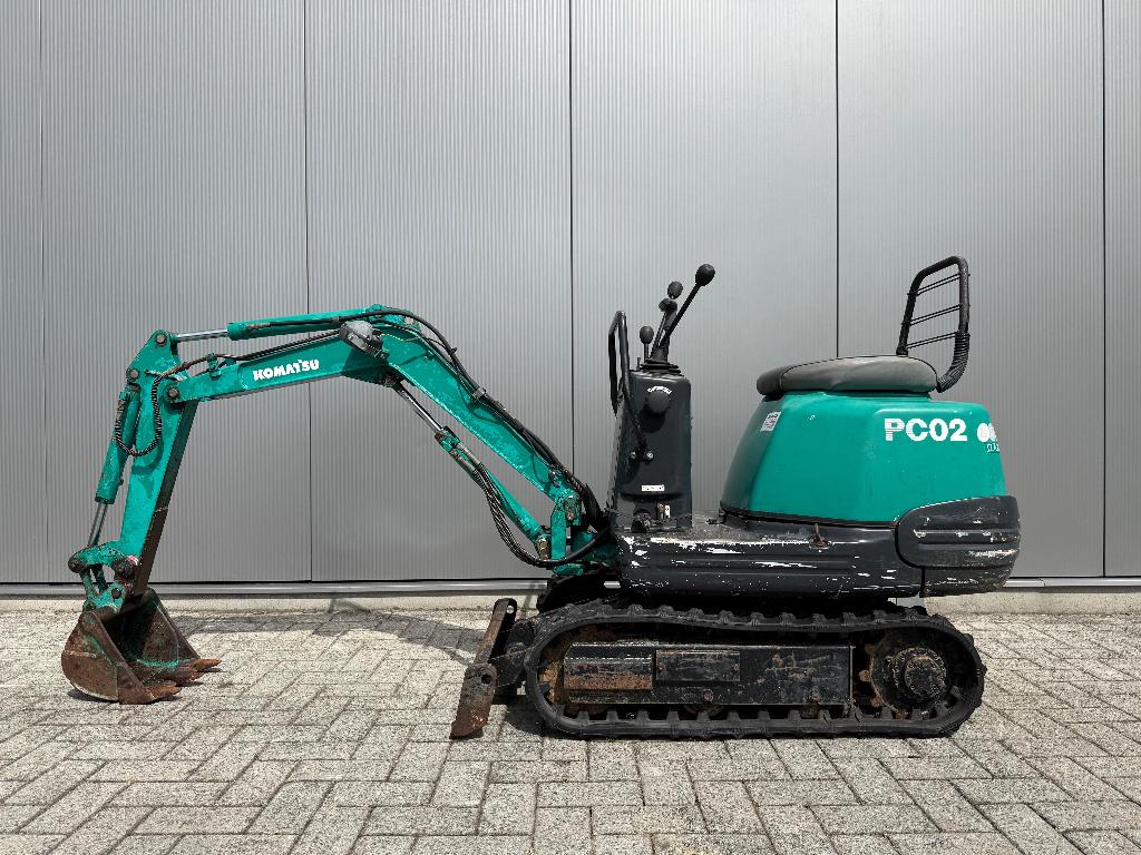 Komatsu PC-02 minigraver 500 kilo - gebruikt - goeie rupsen
