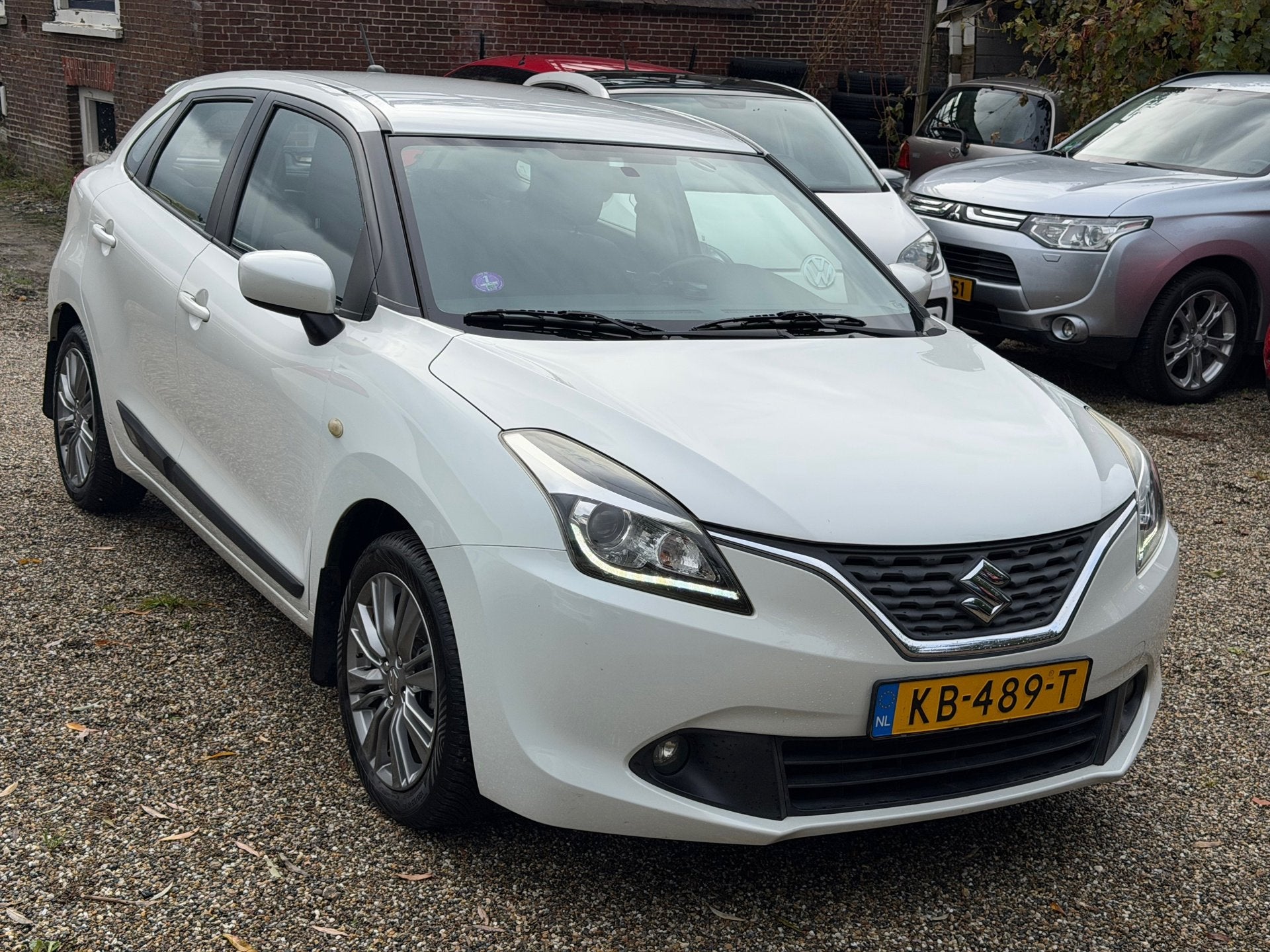 Suzuki Baleno 1.2 Exclusive Automaat Xenon Trekhaak Airco Bl, Auto's, Stof, Gebruikt, 4 cilinders, Wit