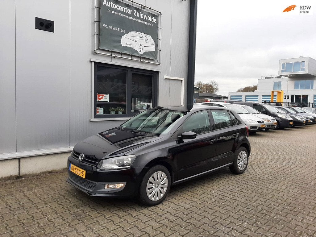 Volkswagen Polo 1.4-16V Comfortline clima navi, Auto's, Volkswagen, Voorwielaandrijving, Zwart, 4 cilinders, Zwart