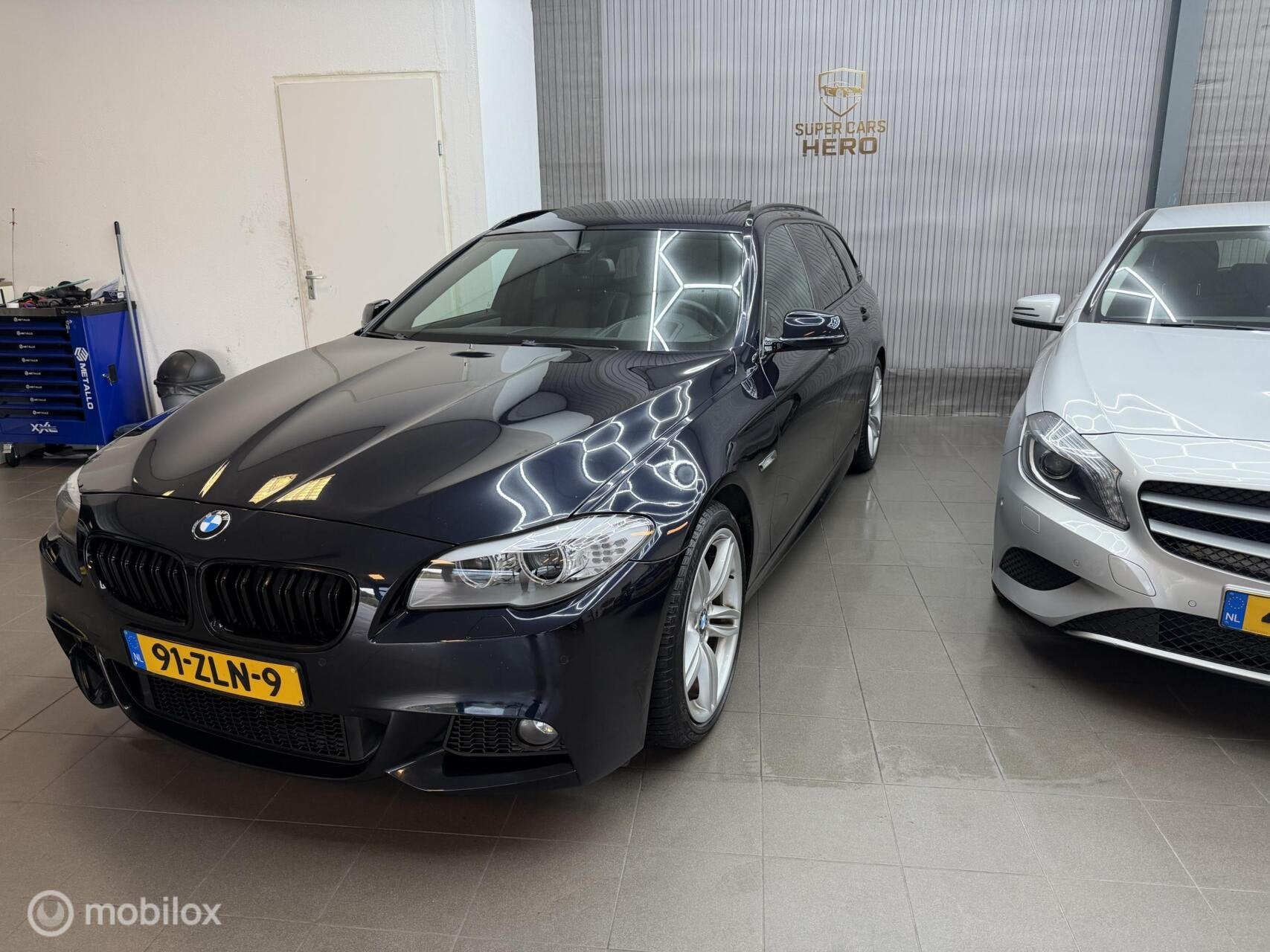 Foto 9 van BMW 5-serie Touring 520i High Executive