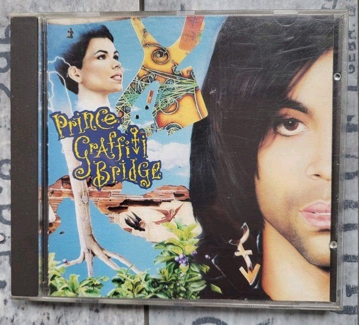 Prince - Graffiti Bridge CD (Pop, Funk, Soundtrack), Cd's en Dvd's, Gebruikt, Pop, Ophalen of Verzenden, Inclusief boekje