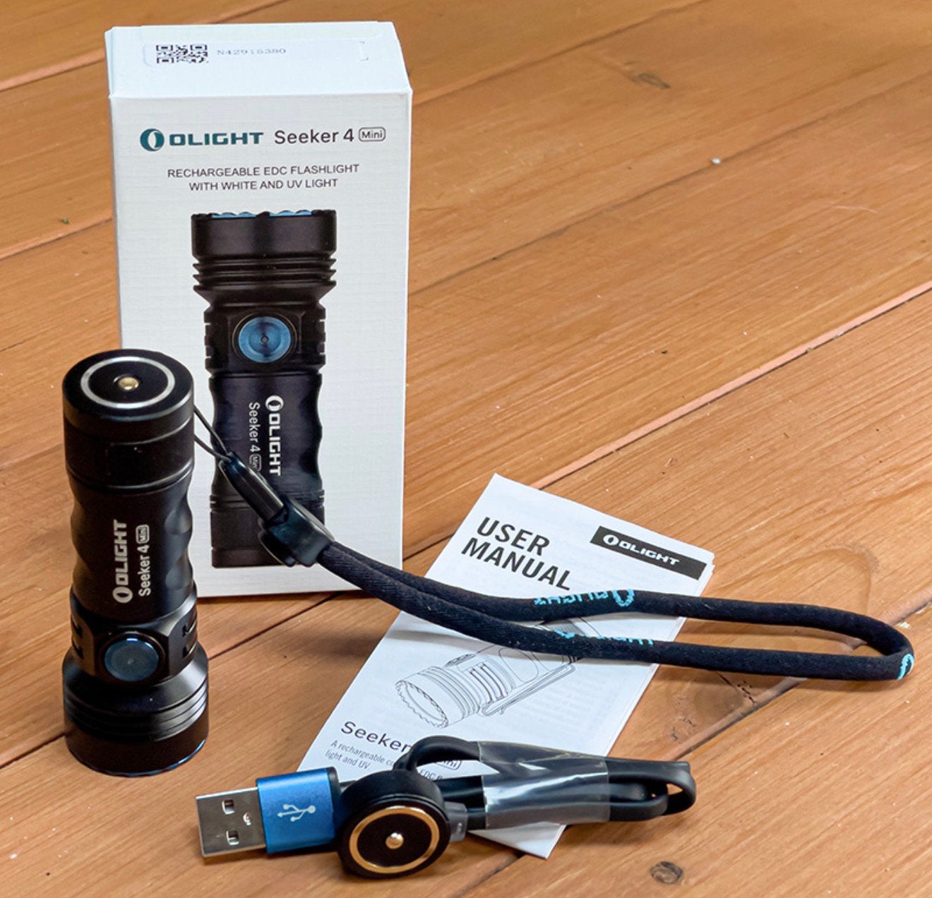 Olight Seeker 4 Mini, Caravans en Kamperen, Zaklampen, Ophalen of Verzenden, Zo goed als nieuw, Batterij