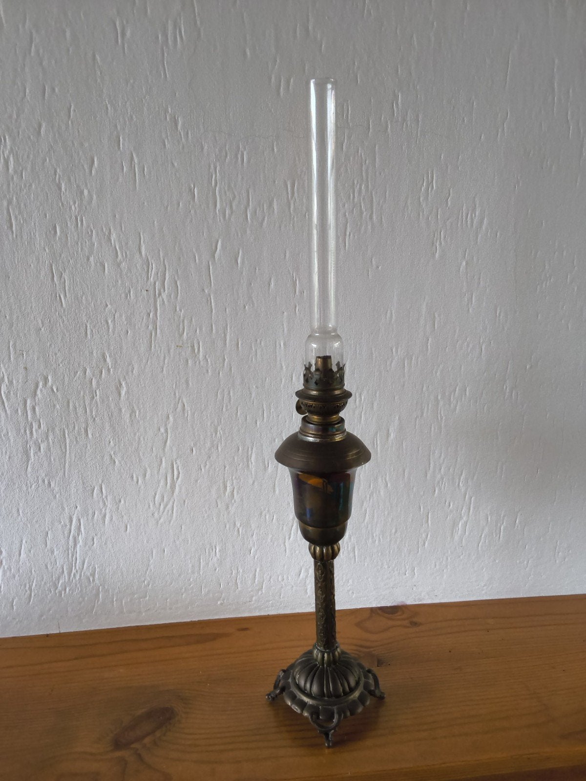Antieke olielamp met glazen schoorsteen, Ophalen