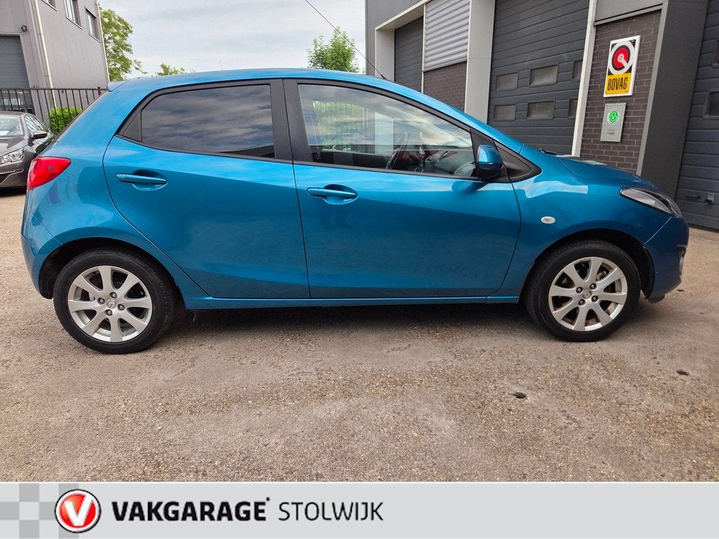 Mazda 2 1.3 Cool Nette auto, Weinig Kilometers, Airco., Auto's, Mazda, Voorwielaandrijving, Euro 5, Zwart, 4 cilinders