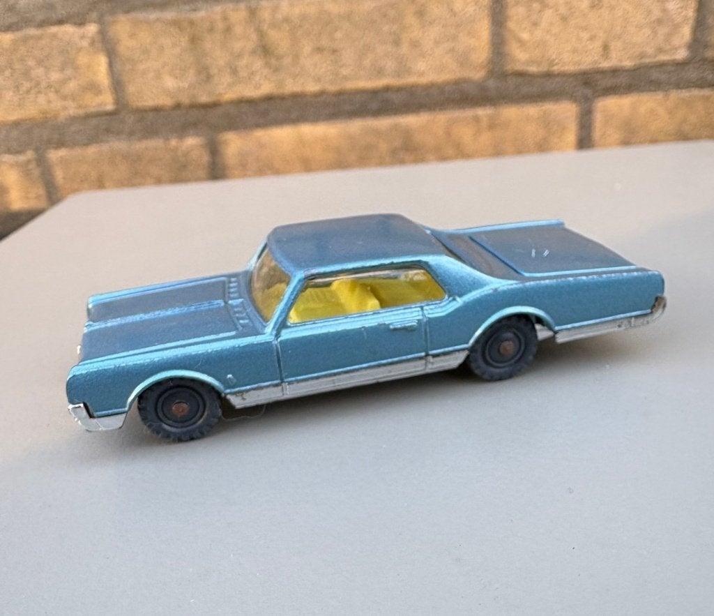 Husky Oldsmobile Starfire Coupé, Hobby en Vrije tijd, Modelauto's | Overige schalen, Ophalen of Verzenden, Zo goed als nieuw, Auto