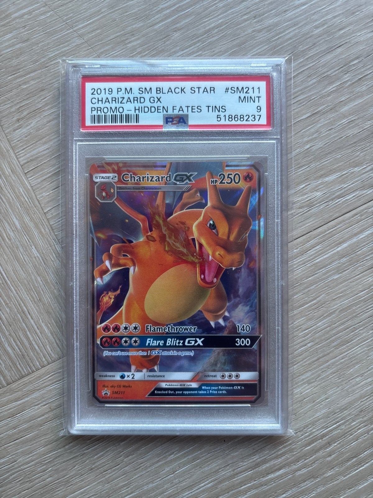 Charizard GX SM211 PSA 9 Mint Promo Hidden Fates, Hobby en Vrije tijd, Verzamelkaartspellen | Pokémon, Ophalen of Verzenden, Zo goed als nieuw