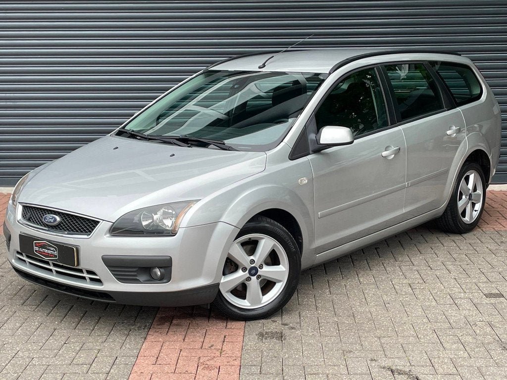 Ford Focus Wagon 1.8-16V Ambiente Flexifuel Airco | Pdc | Cr, Gebruikt, Zwart, 4 cilinders, Handgeschakeld