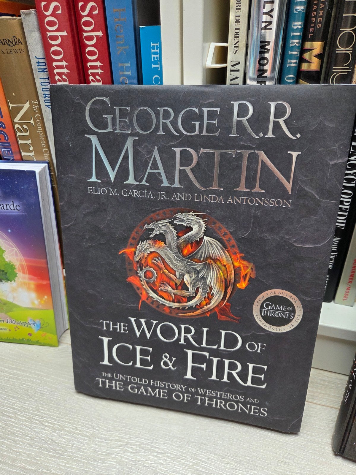 George R.R Martin - World of Ice & Fire + Rise of Dragon, Ophalen of Verzenden, Zo goed als nieuw