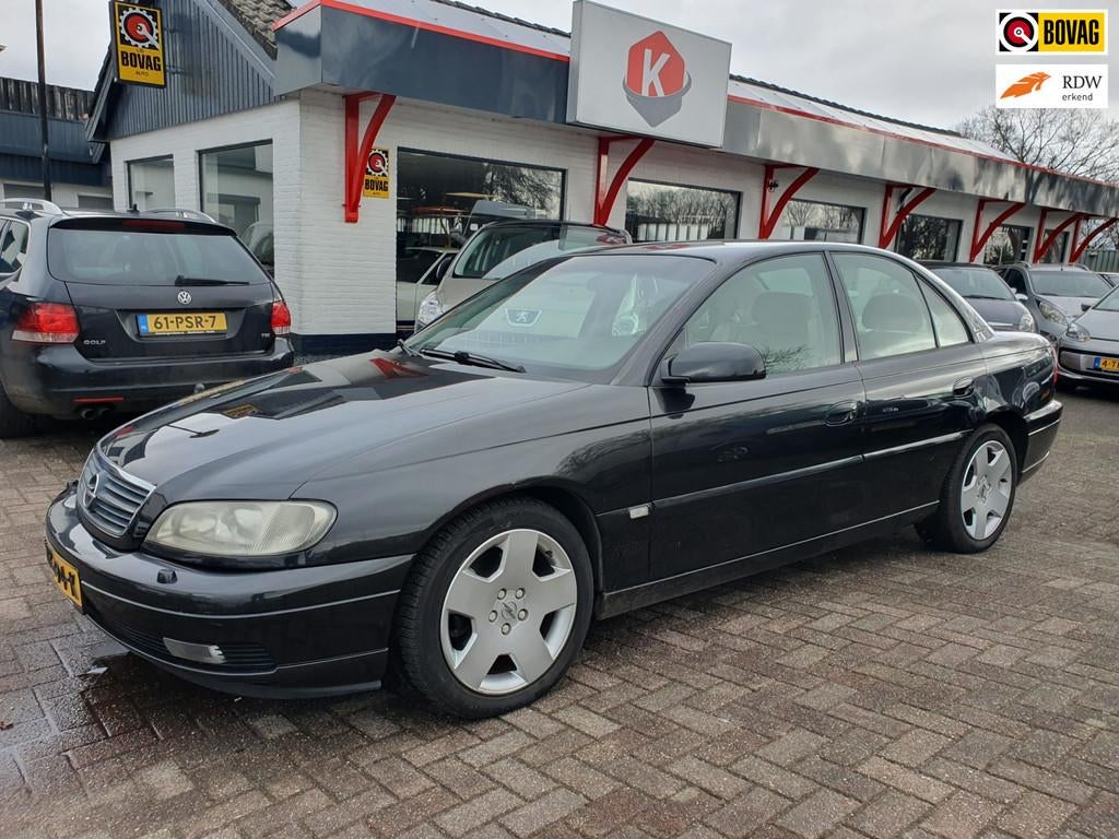 Opel Omega 3.0i V6 Sport AUT/LEER 127240 KM, Auto's, Opel, Omega, Achterwielaandrijving, 1595 kg, Zwart