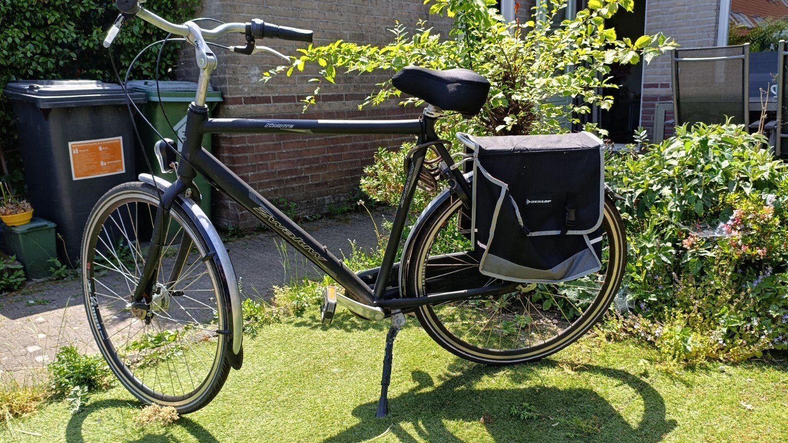 Zwaluw stadsfiets heren met fietstassen, Gebruikt, Velgrem, Versnellingen, Ophalen