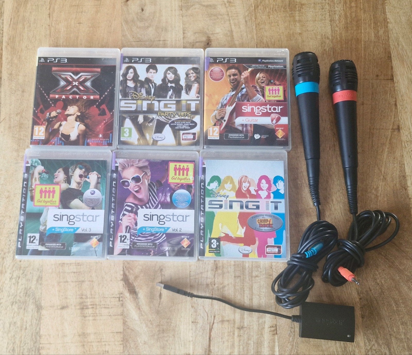 Singstar PS3 bundel met 6 spellen en 2 microfoons, Muziek, Gebruikt, Eén computer, Ophalen of Verzenden