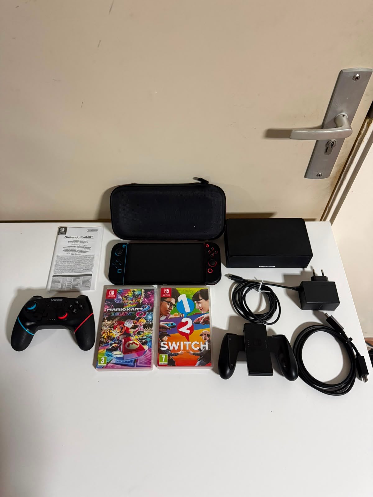 Nintendo Switch OLED 2024 + Mario Kart 8 Deluxe & Meer, Spelcomputers en Games, Games | Nintendo Switch, Overige genres, Ophalen of Verzenden
