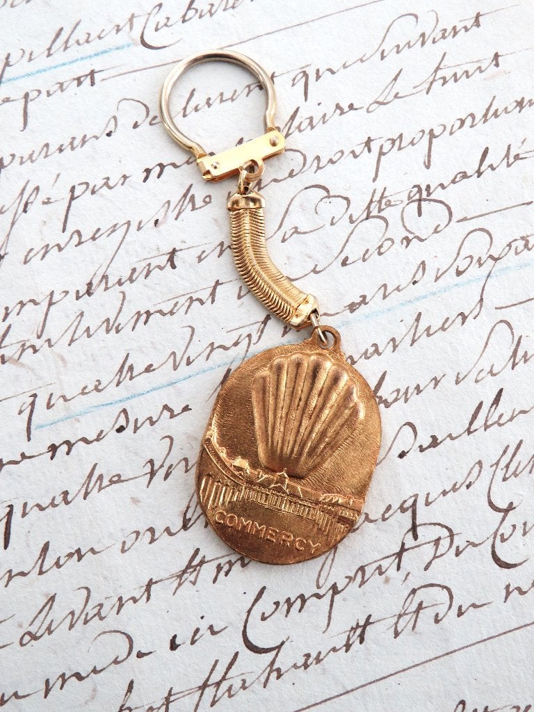 Oude Franse sleutelhanger “Madeleines de la Cloche d’Or”, Ophalen of Verzenden