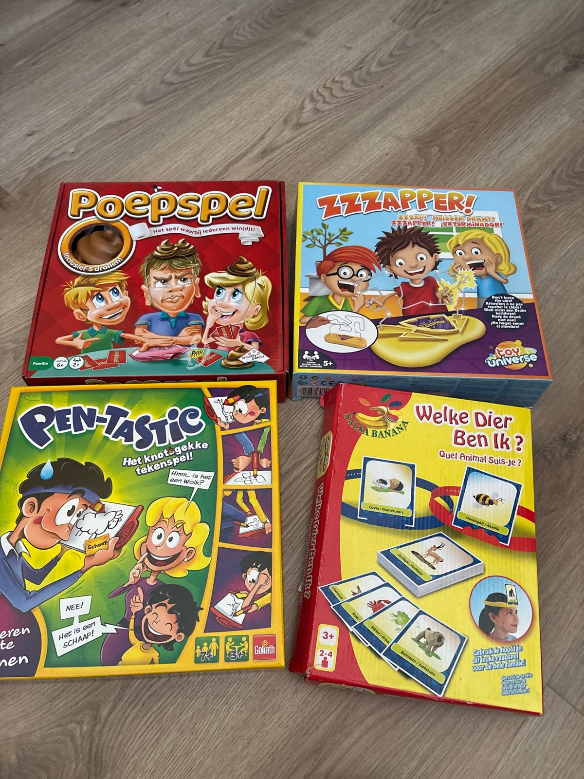 4 leuke bordspellen: Poepspel, Zzzapper, Pen-tastic, Welke D, Een of twee spelers, Ophalen, Gebruikt
