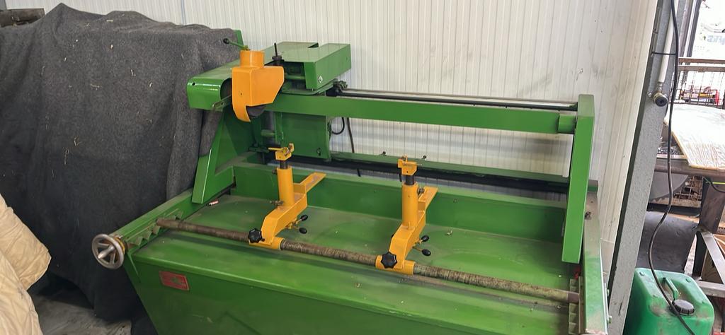 Kooienslijpmachine, Ophalen