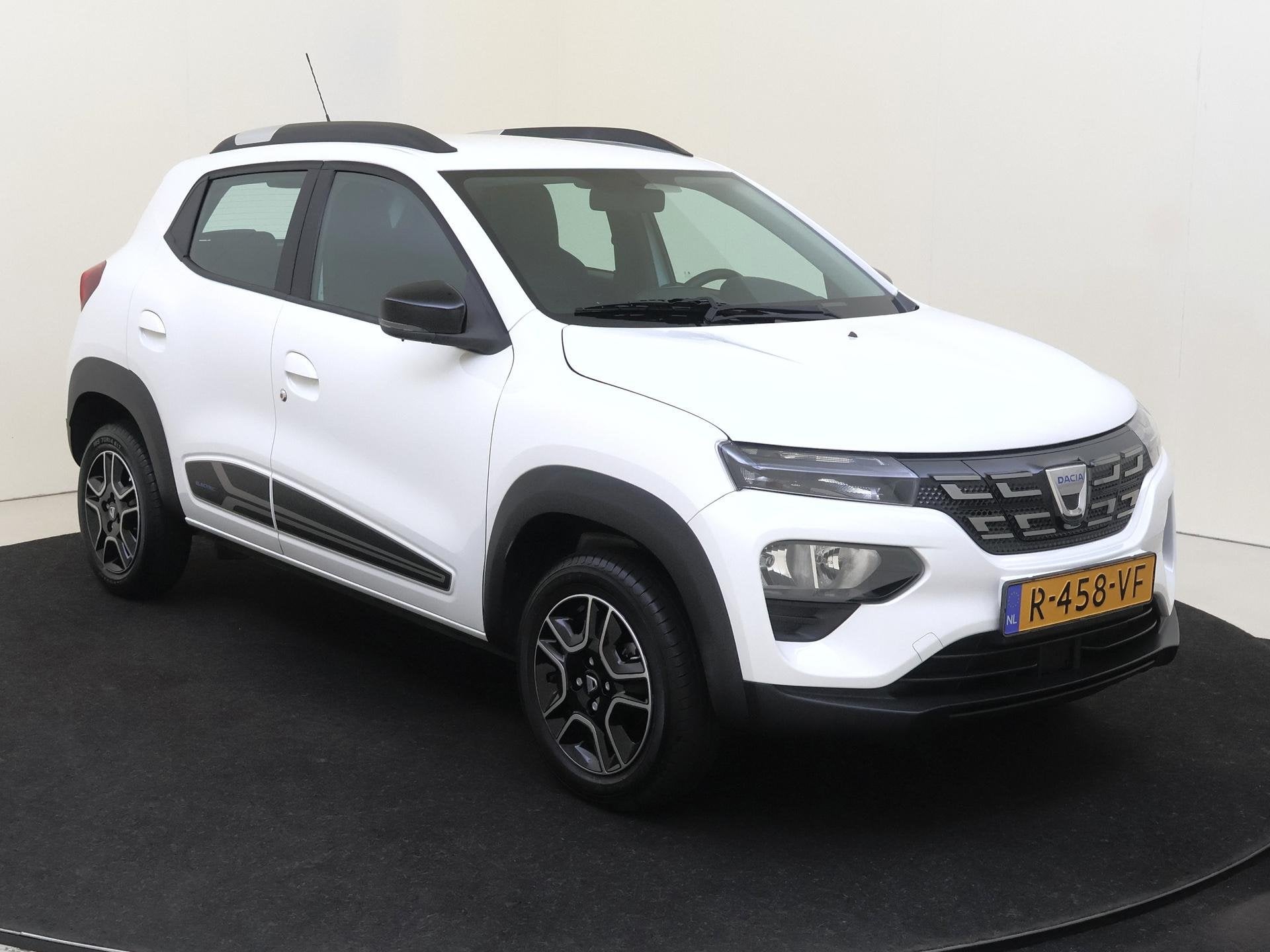 Dacia Spring Comfort 27 kWh | Airco, Gebruikt, Leder en Stof, Wit, Te koop