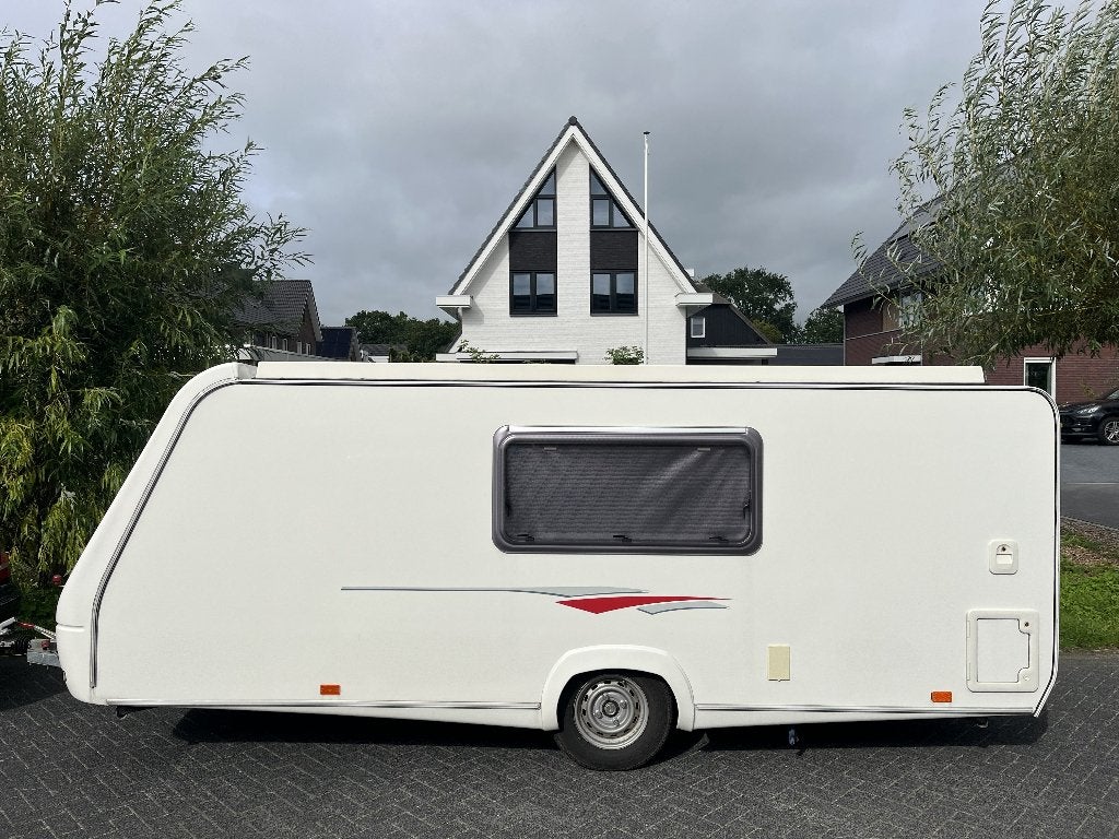 Zeer mooie Trigano Rubis 420 hefdakcaravan, Caravans en Kamperen, Trigano, Bedrijf, Treinzit, 750 - 1000 kg