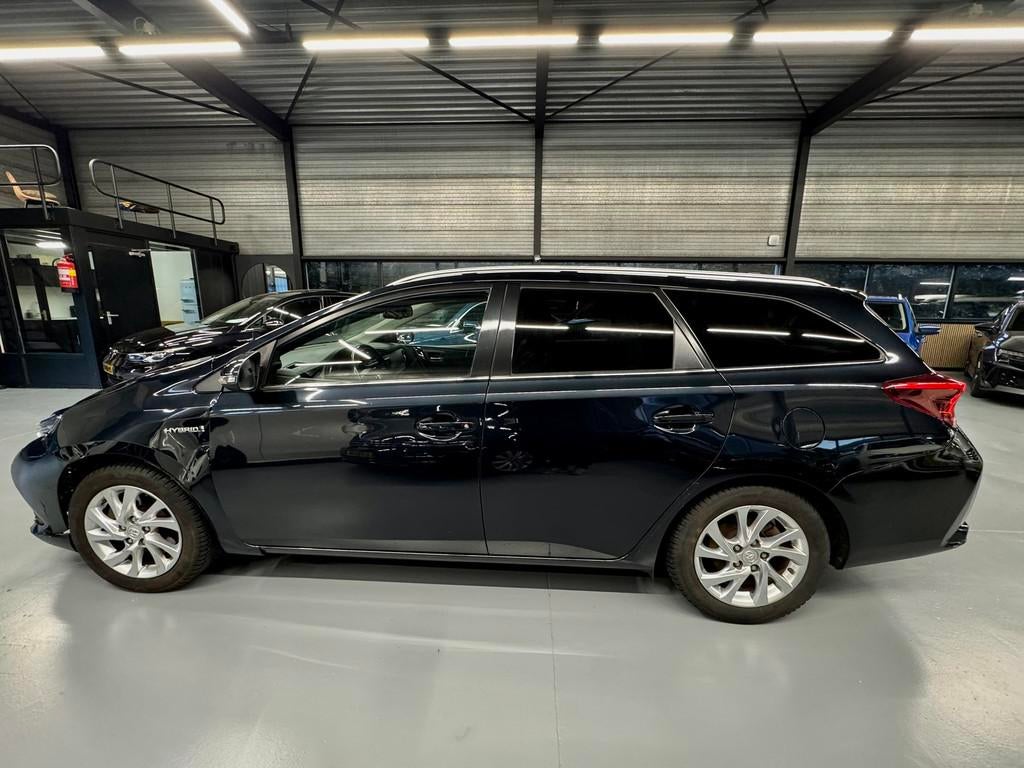 Toyota Auris Touring Sports 1.8 Hybrid Lease Pro, Gebruikt, Euro 6, Leder en Stof, Origineel Nederlands