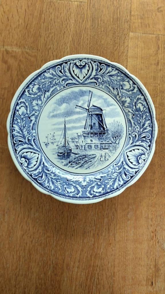 Delftsblauw sierbord, Ophalen