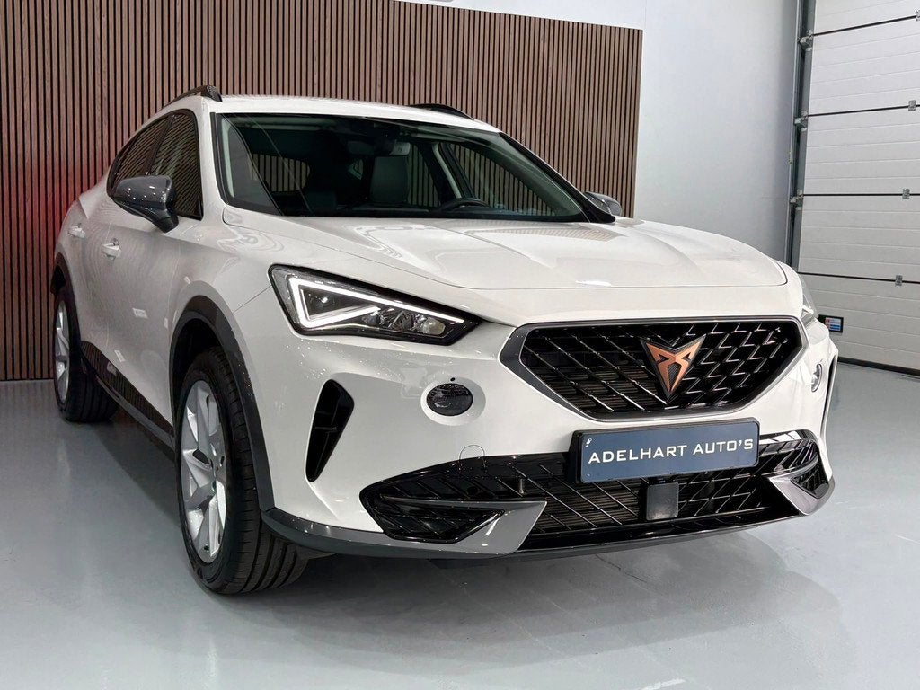 CUPRA Formentor 1.4 e-Hybrid Business 204 PK Automaat / Navi, Auto's, Cupra, Zwart, 4 cilinders, Formentor, Leder en Stof