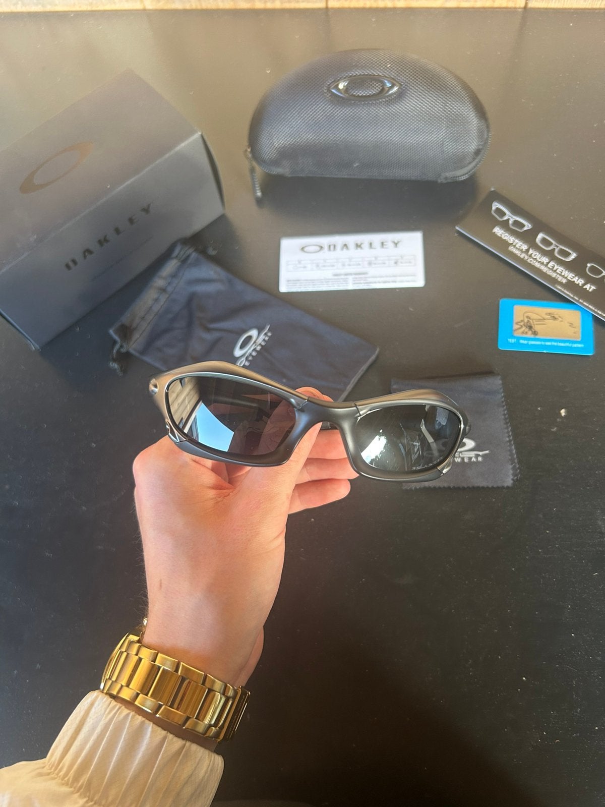 Oakley splice zonnebril - nieuwstaat zwart, Sieraden, Tassen en Uiterlijk, Zonnebril, Zwart, Nieuw, Ophalen of Verzenden