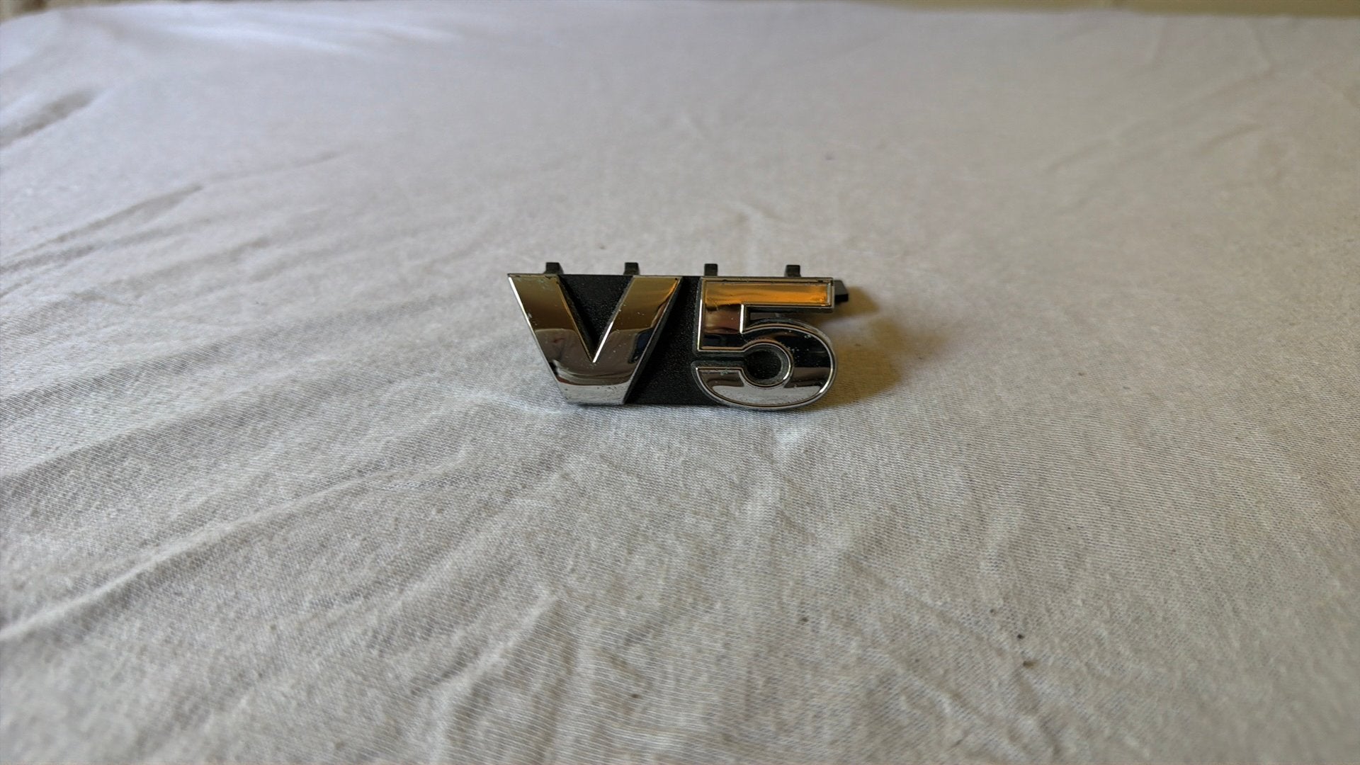 OEM Volkswagen V5 embleem grill, Auto-onderdelen, Ophalen of Verzenden, Gebruikt, Volkswagen