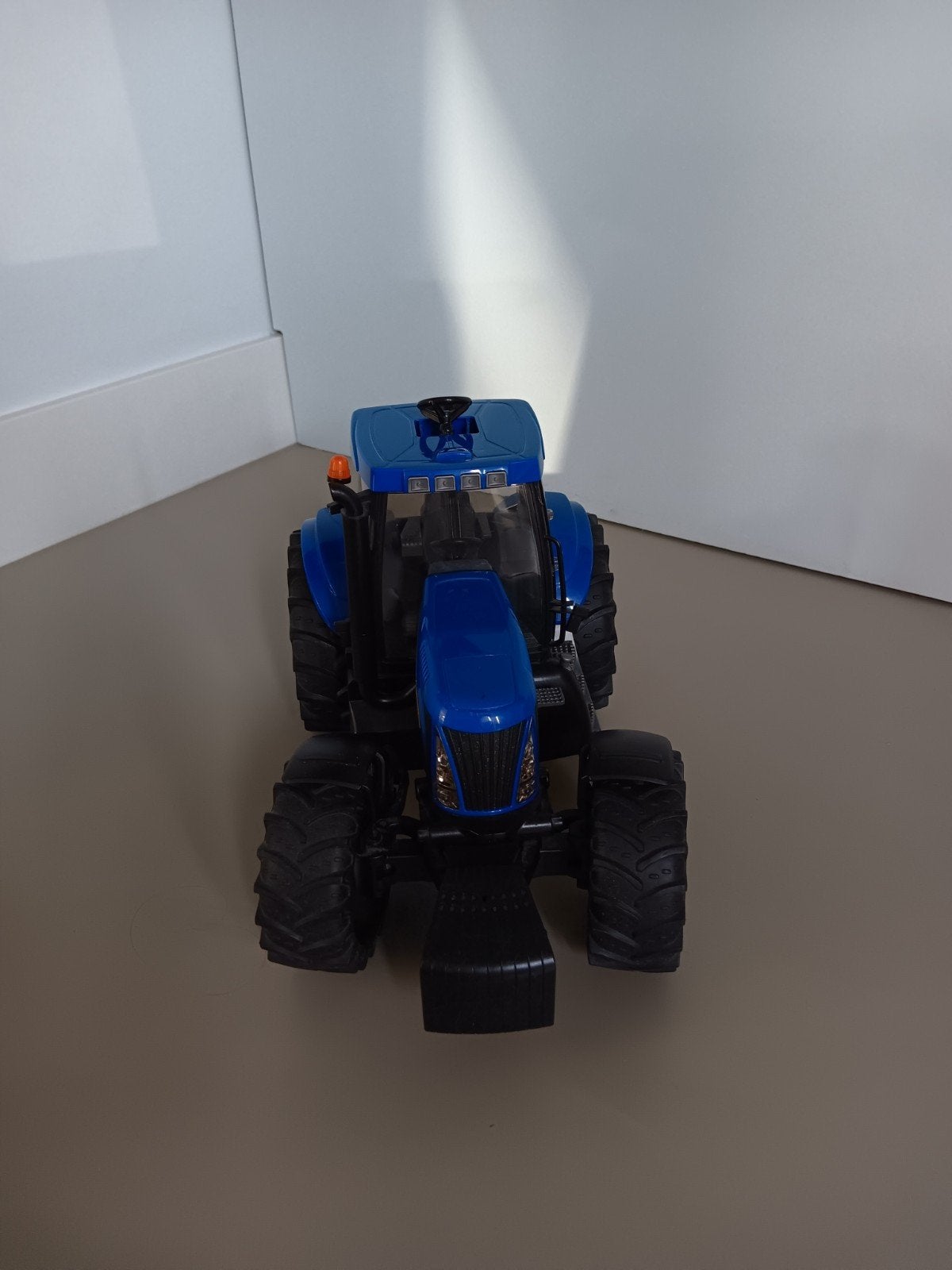 New Holland speelgoedtractor - Blauw, Ophalen of Verzenden, Zo goed als nieuw