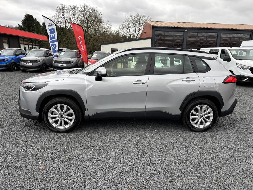 Toyota Corolla Cross HYBRID 140 ACTIVE (bj 2024, automaat), Auto's, Stof, Gebruikt, Met garantie (alle), Bedrijf