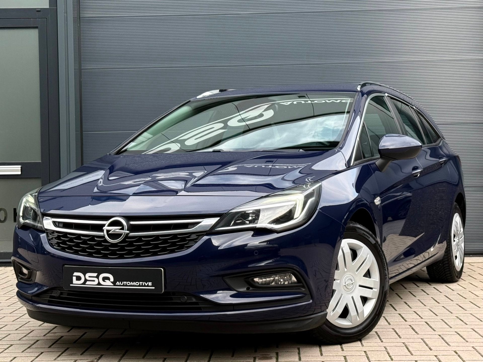 Opel Astra Sports Tourer 1.6 CDTI Business+ |Xenon|Navigatie, Auto's, Voorwielaandrijving, Stof, Gebruikt, Euro 6