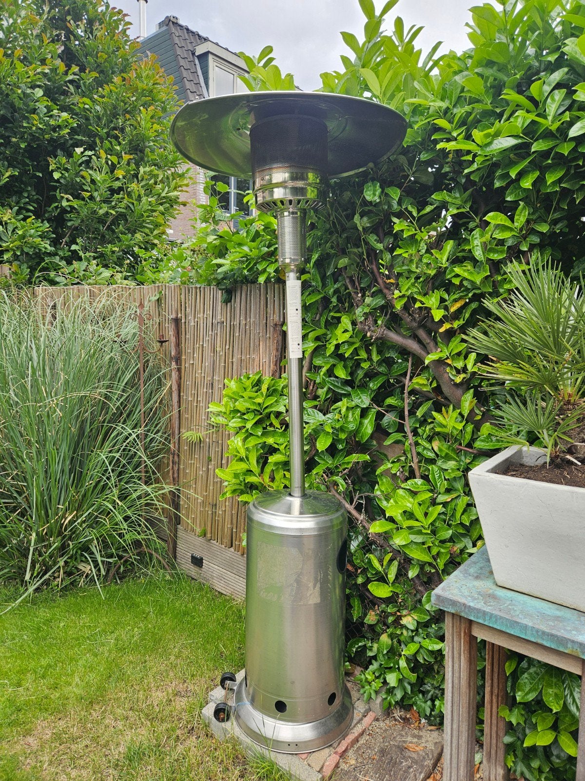 Terrasverwarmer op gas met beschermhoes, Ophalen