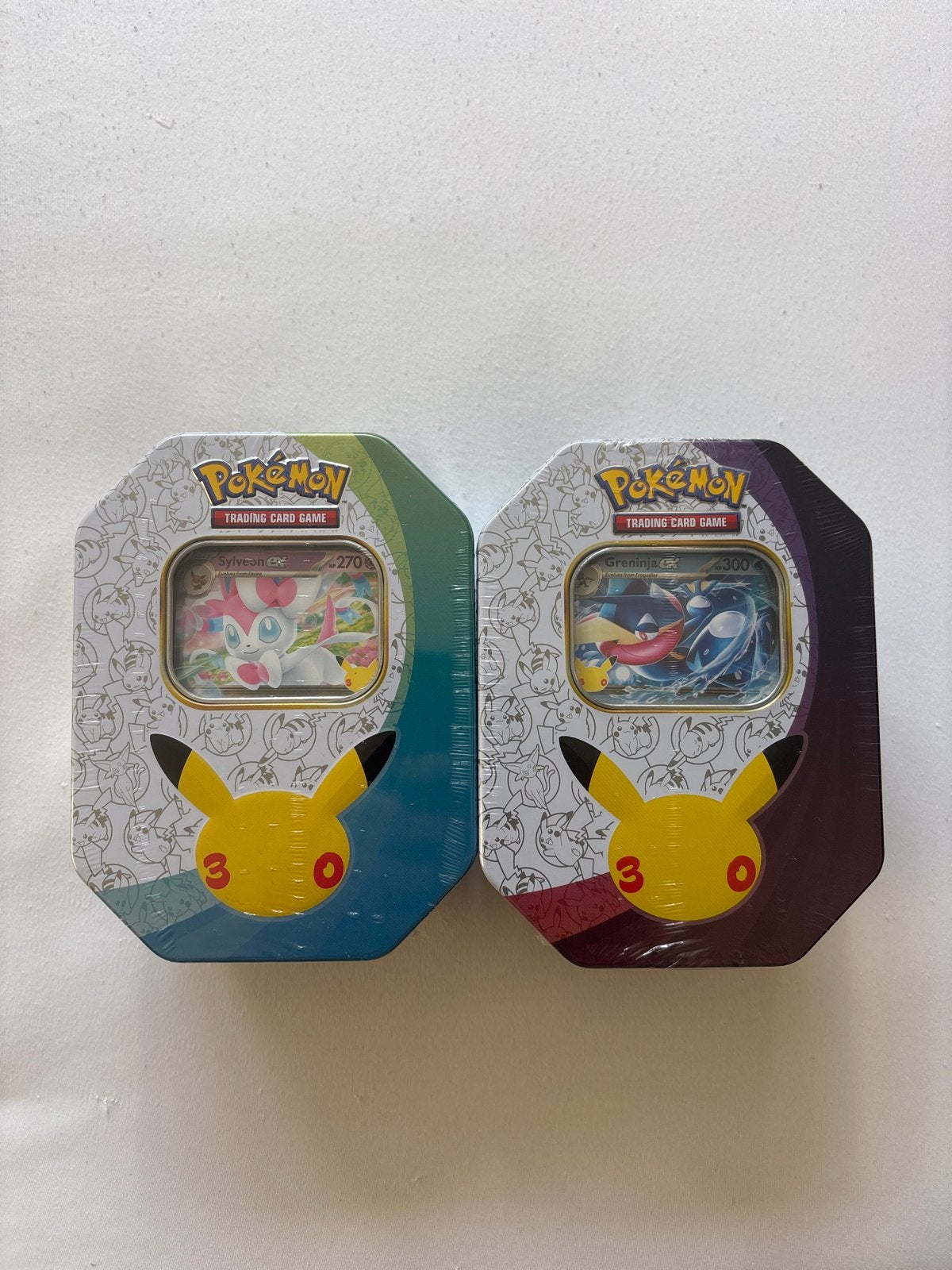 Pokémon 30th Celebrations EX Tins - Sylveon & Greninja, Ophalen of Verzenden, Nieuw, Overige typen