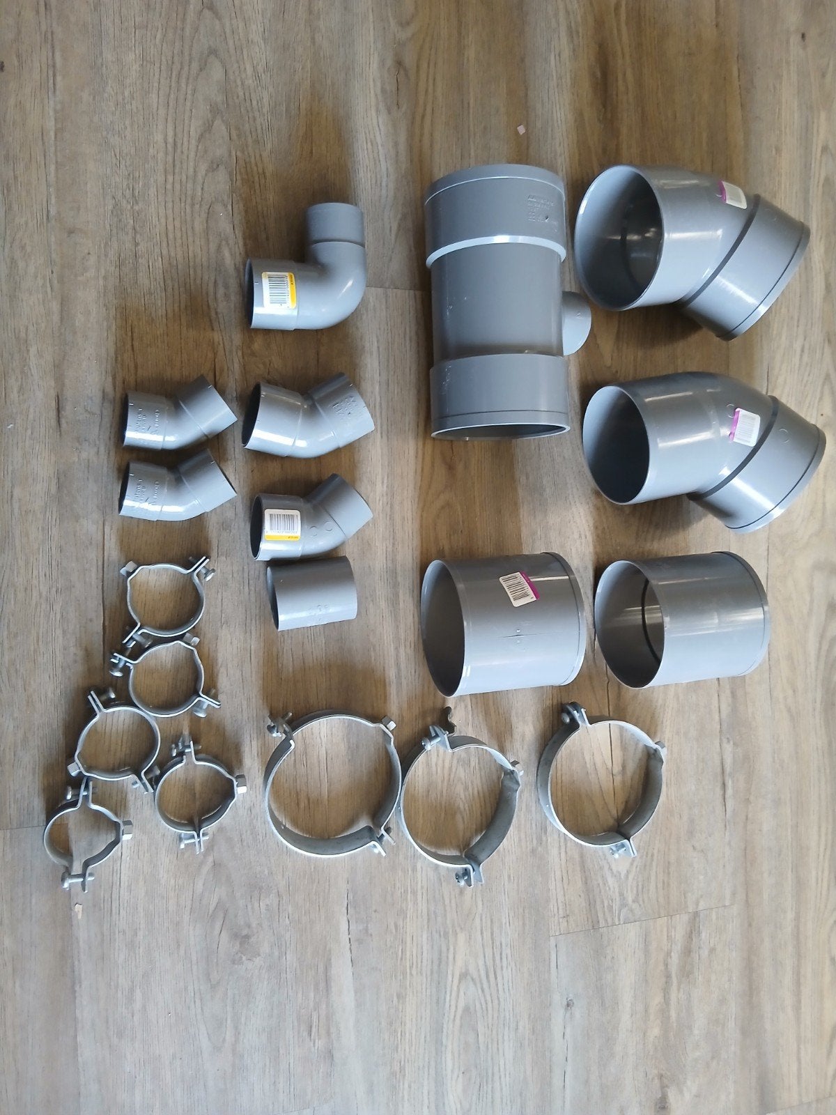 PVC Afvoerbuizen en Beugels - Diverse Maten en Hoeken, Ophalen