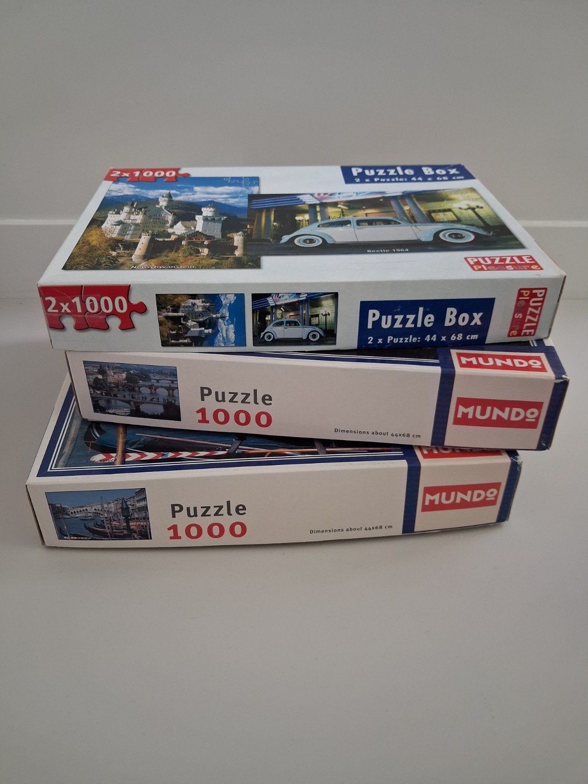 4x Puzzel 1000 stukjes Neuschwanstein, Kever, Praag, Ve, Ophalen of Verzenden, 500 t/m 1500 stukjes, Zo goed als nieuw