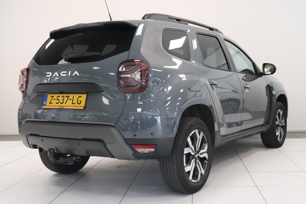 Dacia Duster 1.3 TCe 150 Journey | Camera | Trekhaak | Clima, Auto's, Dacia, Stof, Gebruikt, 4 cilinders, Origineel Nederlands