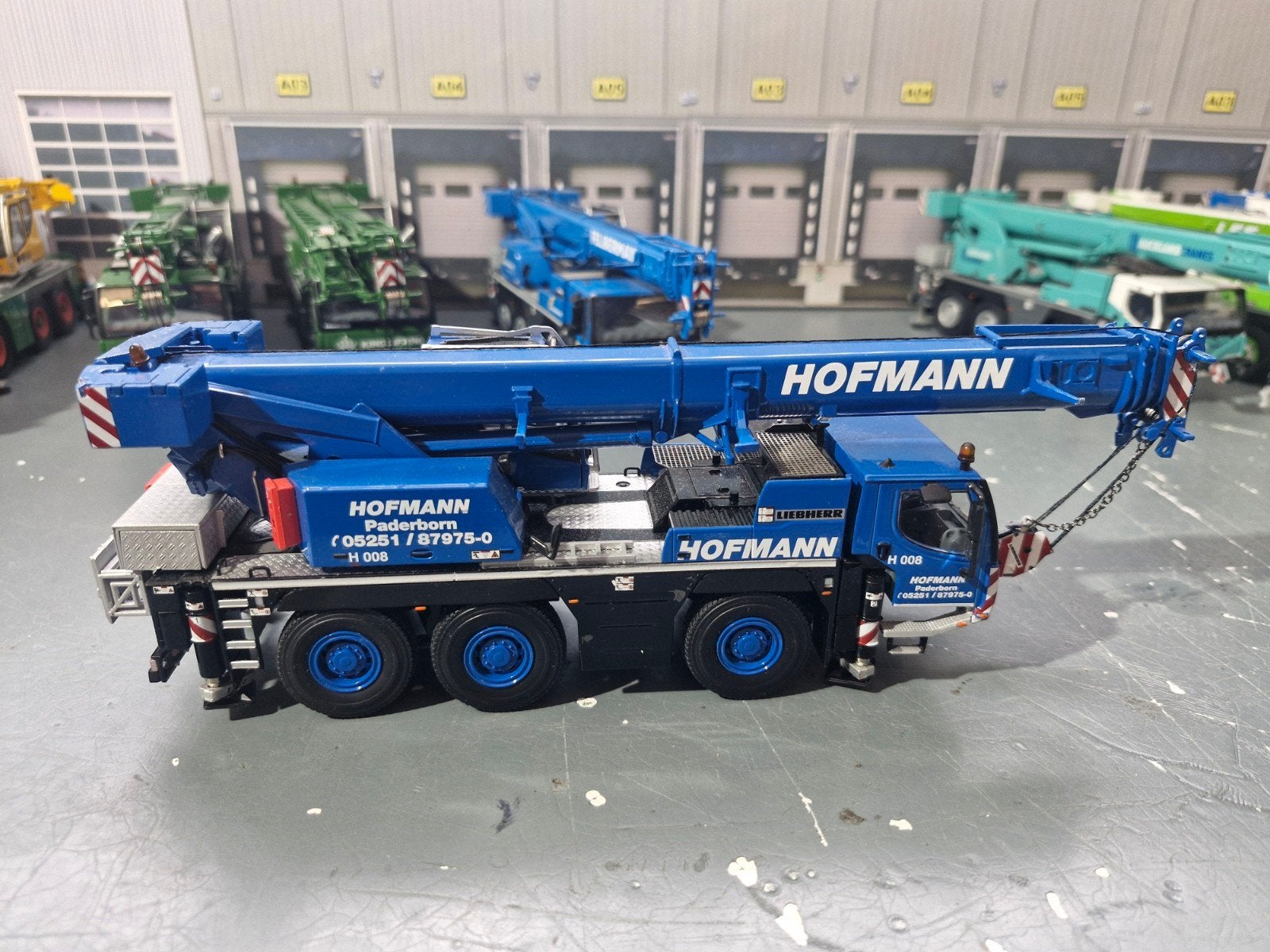 Liebherr ltm 1050 wsi HOFFMAN, Hobby en Vrije tijd, Modelauto's | 1:50, Ophalen of Verzenden, Zo goed als nieuw, Hijskraan, Tractor of Landbouw