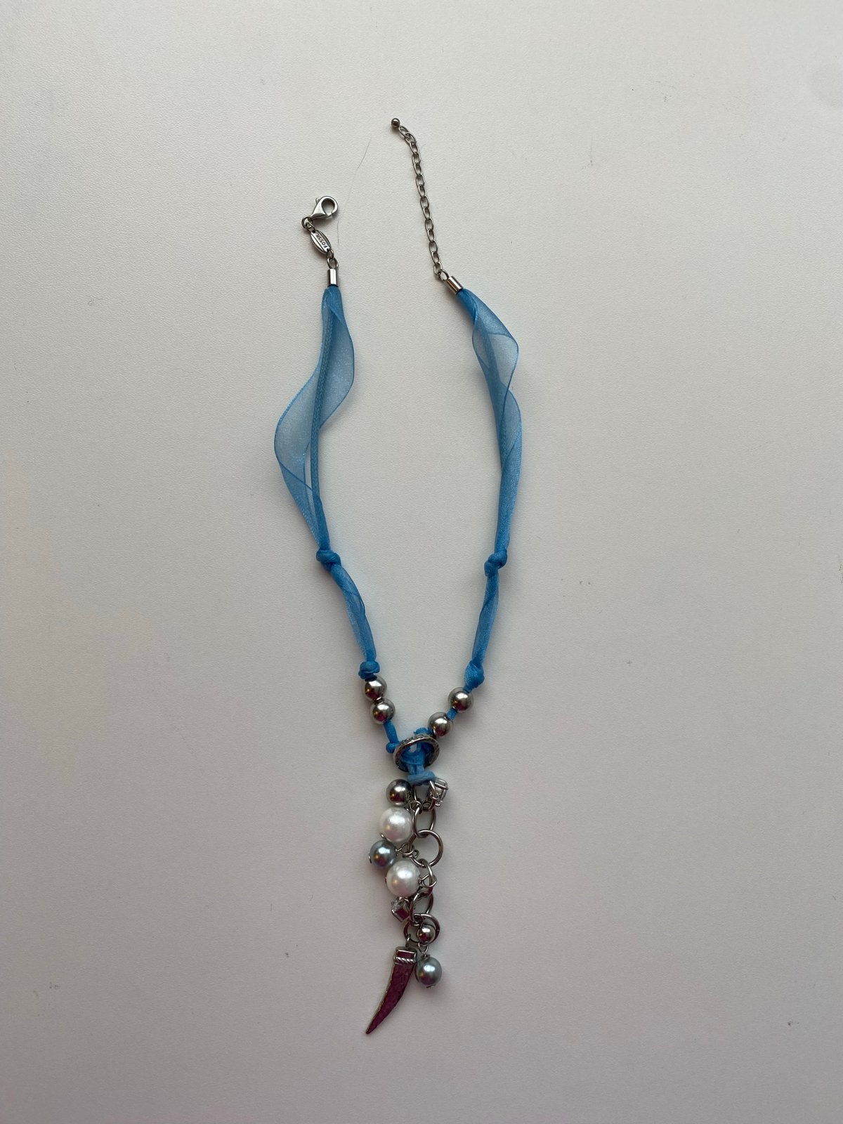 Blauwe ketting met hanger en parels merk fossil, Zo goed als nieuw, Overige materialen, Met hanger, Verzenden