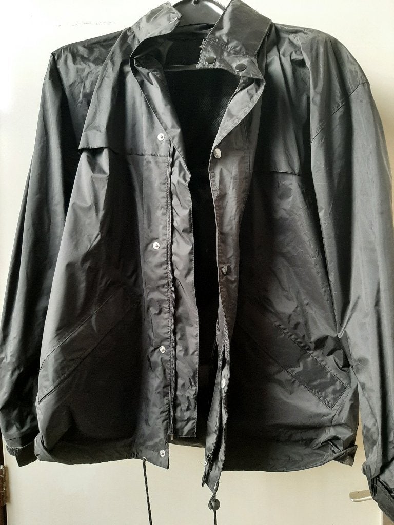 2x regenjas HEMA opv capuchon maat L en M reflectie NIEUW, Ophalen of Verzenden, Nieuw, Regenjas, Heren