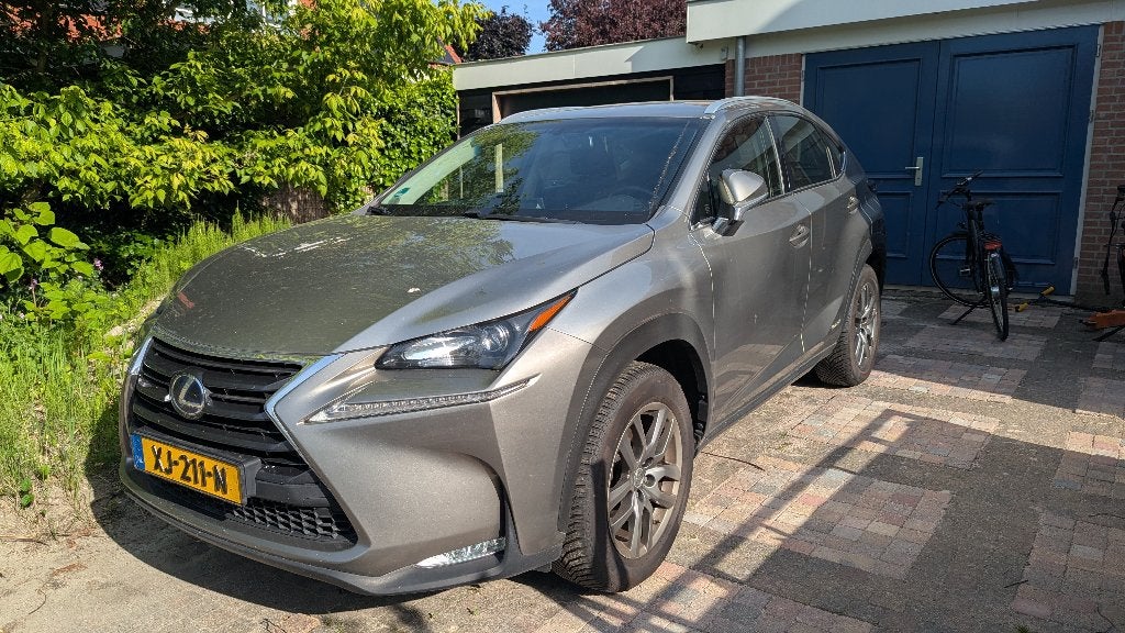 Lexus NX 300H 2.5 E-cvt Luxury line - ZUINIG, Auto's, Lexus, Bruin, Leder, 155 pk, SUV of Terreinwagen